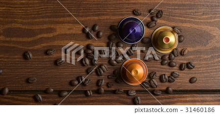 Coffee capsule with coffee beans Coffee capsule with coffee beans 31460186