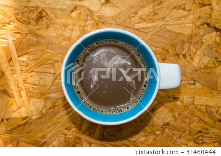 Coffee on the wood. 31460444