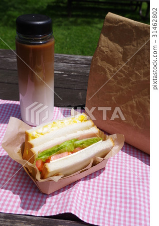Sandwich and coffee latte 31462802