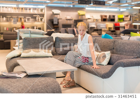 Woman shopping for furniture, sofa and home decor 31463451