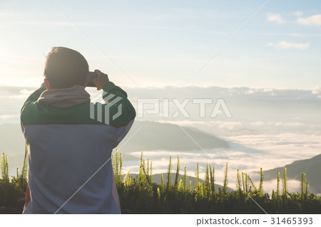 Tourism taking photo of mountain at Doi Phu Kha Tourism taking photo of mountain at Doi Phu Kha 31465393
