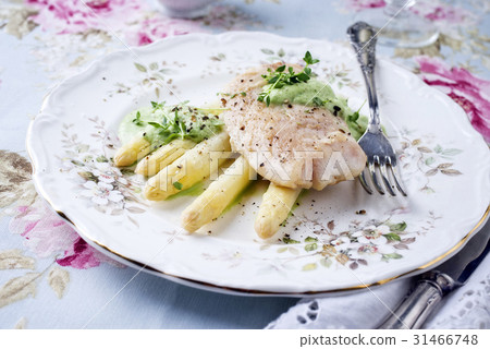 Cod Filet with White Asparagus on Plate 31466748