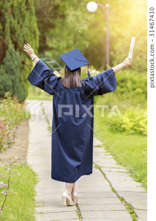Young woman in graduation day celebrating 31467410