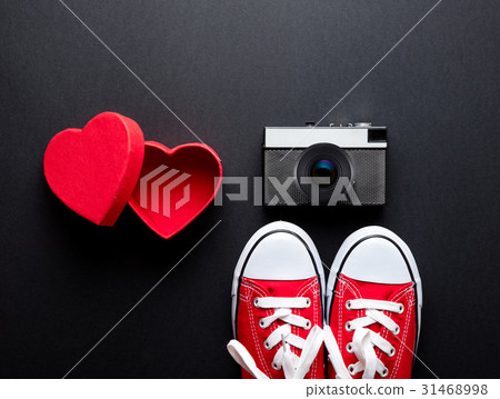 gumshoes, camera and box 31468998