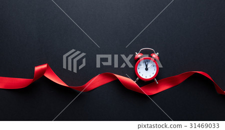 alarm clock and ribbon alarm clock and ribbon 31469033