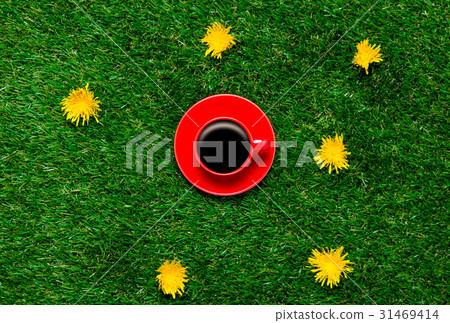 cup of coffee on grass cup of coffee on grass 31469414