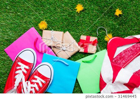 shopping bags, gifts, jacket on hanger shopping bags, gifts, jacket on hanger 31469445