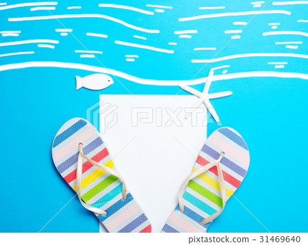 sandals, sheet of paper, starfish and toy 31469640