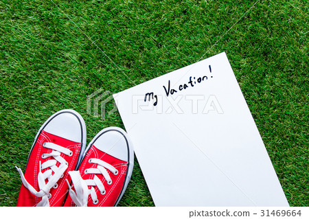 gumshoes and sheet of paper 31469664