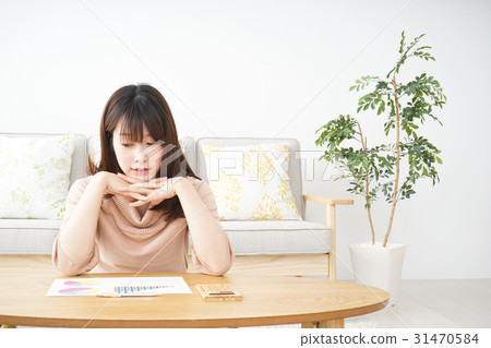 A young woman working at home at home A young woman working at home at home 31470584