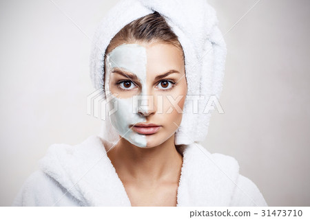 Beautiful woman with mask on her face. Beautiful woman with mask on her face. 31473710