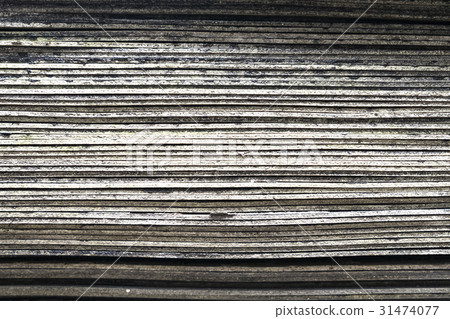 Stack of old rubber floor tile,layer background 31474077