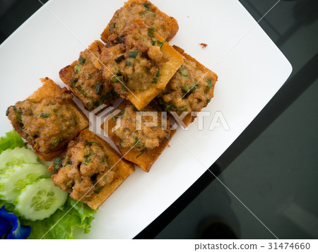 Fried bread with minced pork spread. Fried bread with minced pork spread. 31474660