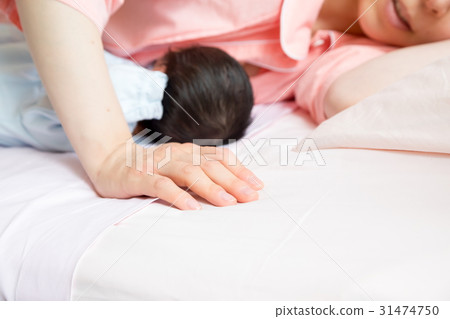 Baby breastfeeding with baby just after birth Mother born fetus infant baby girls private room baby baby blur 31474750