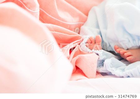 Baby breastfeeding with baby just after birth Mother born fetus infant baby girls private room baby baby blur Baby breastfeeding with baby just after birth Mother born fetus infant baby girls private room baby baby blur 31474769