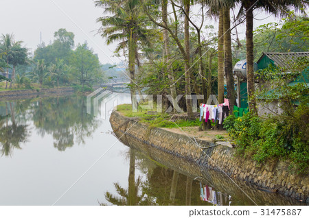 River village in Vietnam. River village in Vietnam. 31475887