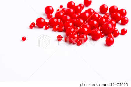 Red beads on white background free space Red beads on white background free space 31475913