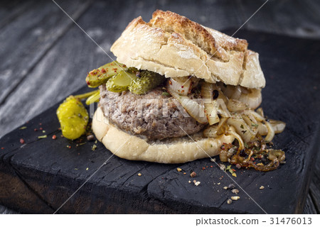 Hamburger on burnt Wooden Board 31476013