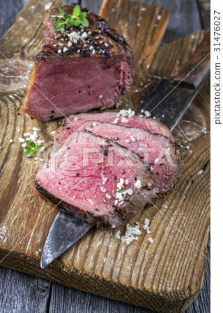 Barbecue Point Steak on old Cutting Board Barbecue Point Steak on old Cutting Board 31476027