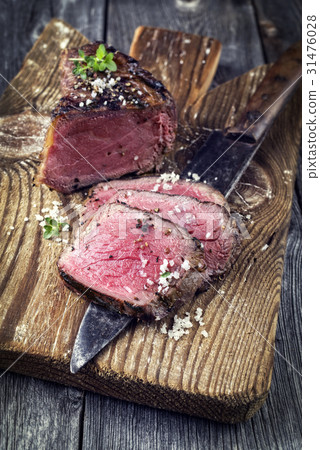 Barbecue Point Steak on old Chopping Board 31476028