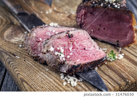Barbecue Point Steak on old Chopping Board 31476030