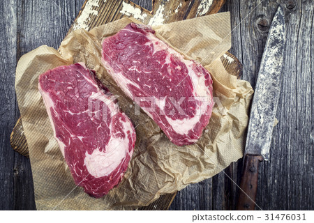 Dry Aged Rib Eye Steak on Cutting Board 31476031
