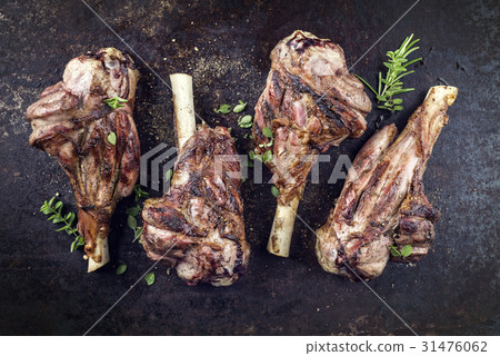 Barbecue Lamb Knuckles on old Metal Sheet 31476062