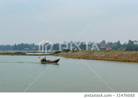 A fisherman on a boat A fisherman on a boat 31476088