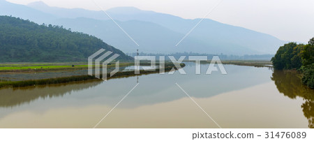Torrential water on river in flood season 31476089