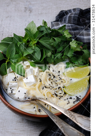 Rice soup with noodles and tofu 31478634