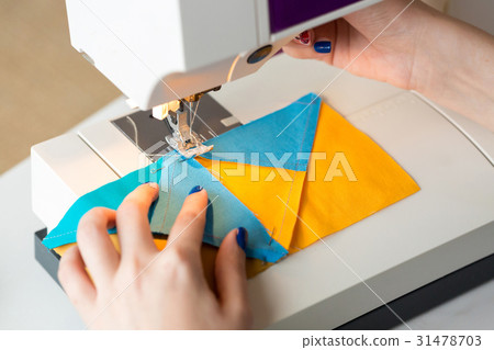 needlework and quilting in the workshop of a 31478703