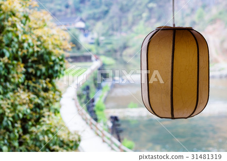 chinese lantern and unfocused irrigation canal chinese lantern and unfocused irrigation canal 31481319
