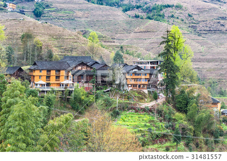 view of wooden houses in village on terraced hill view of wooden houses in village on terraced hill 31481557