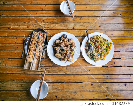 top view of served chinese dinner in rustic eatery 31482289