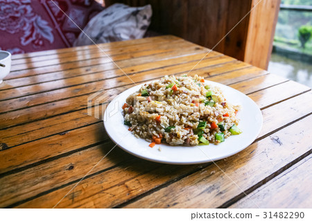 portion of fried rice with vegetables 31482290