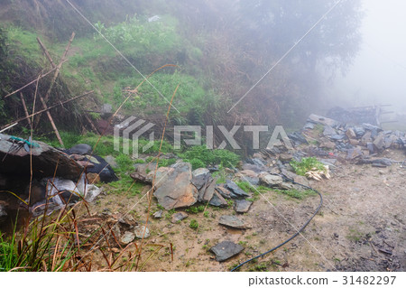 wet tent in rainforest on hill in Tiantouzhai 31482297