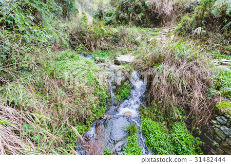water stream on mountain slope in Dazhai country 31482444