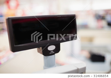 Focus on foreground of the cash register screen 31486854