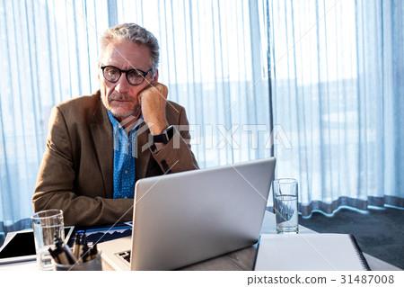 Businessman at office Businessman at office 31487008