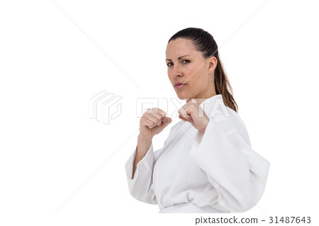 Fighter performing karate stance 31487643