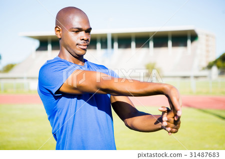 Athlete warming up in a stadium 31487683