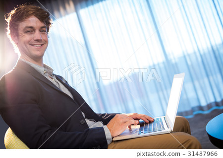 Young businessman smiling Young businessman smiling 31487966