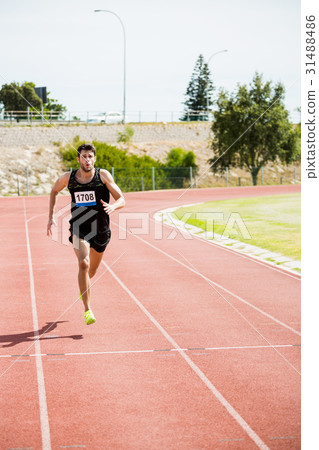 Athlete running on the racing track Athlete running on the racing track 31488486