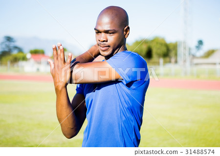 Athlete warming up in a stadium 31488574