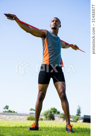 Athlete carrying javelin on his shoulder Athlete carrying javelin on his shoulder 31488877