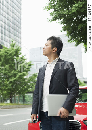 Casual middle businessman red car 31489527