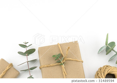 Brown gift boxes decorated with leaves 31489594