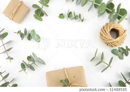 Brown gift boxes decorated with leaves Brown gift boxes decorated with leaves 31489595