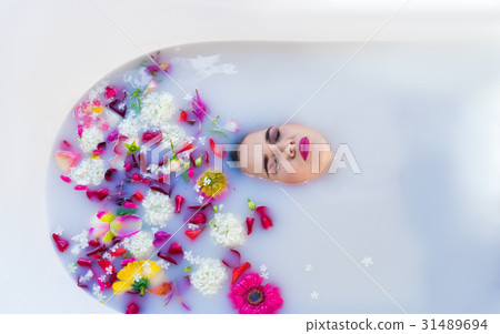 Closeup view of Woman in bath. Her face is 31489694