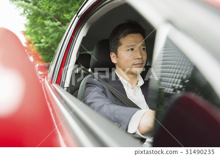 Casual middle businessman red car Casual middle businessman red car 31490235